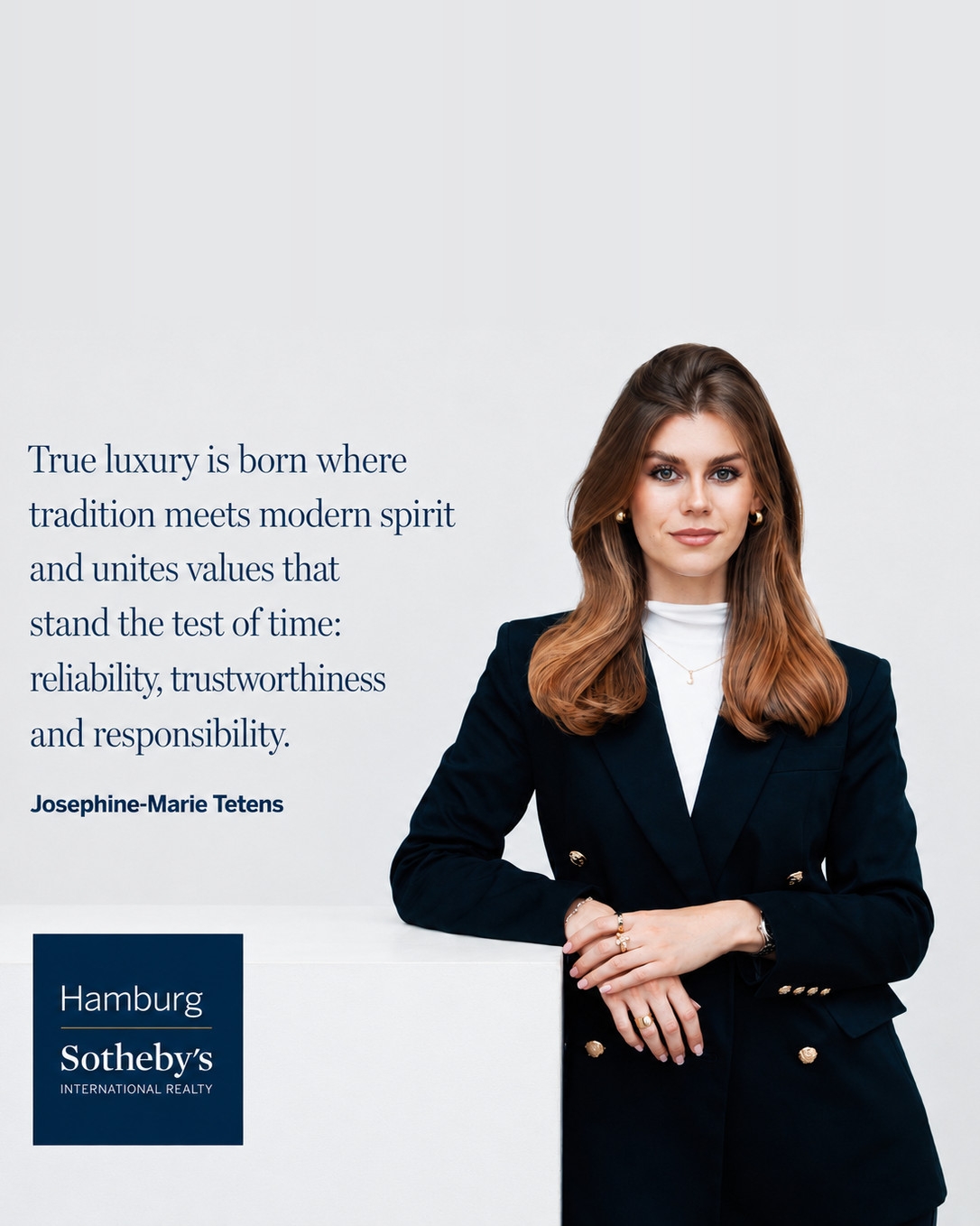 Professional woman in business attire at Hamburg Sotheby's International Realty.